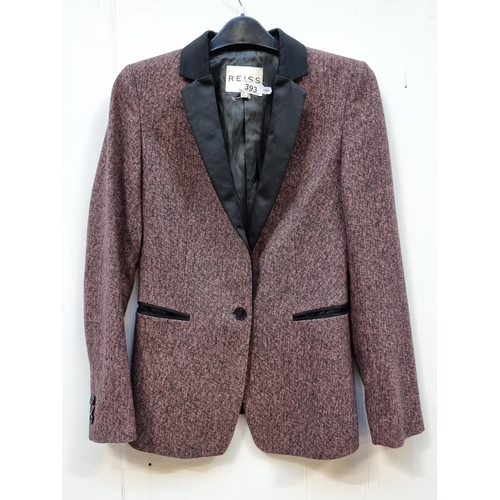 393 - A Reiss lady's blazer in a UK size 8. A smart looking piece in a woven shade of pinks and mauve, wit... 