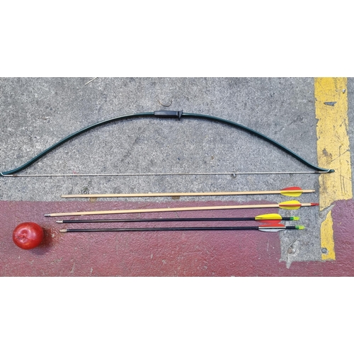 395 - A forest green bow with string, accompanied by four arrows.