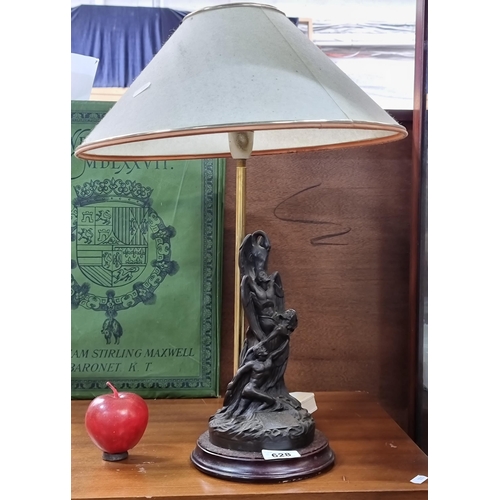 628 - A striking, figural table lamp depicting the transformation of The Children of Lir. Sculpted by B.A ... 