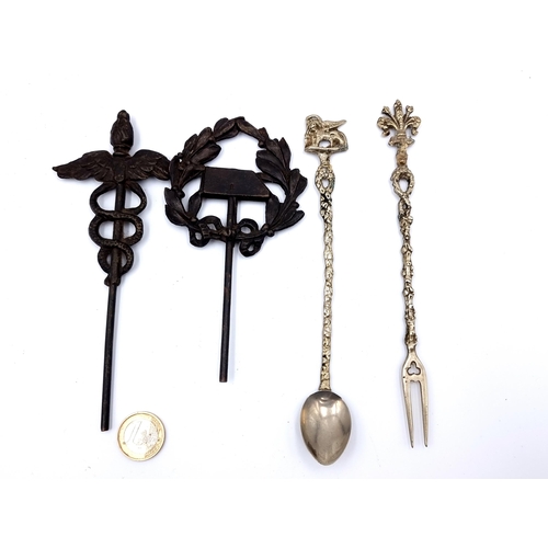 660 - An interesting collection of four items, which includes two antique Caduceus Hermes symbol grave mar... 