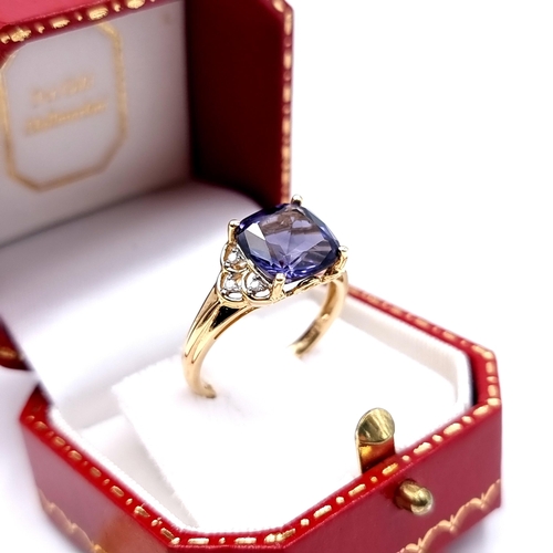 667 - Star lot : A beautiful 9 carat gold Amythyst and Diamond ring of a generous 5.9 carats and set with ... 