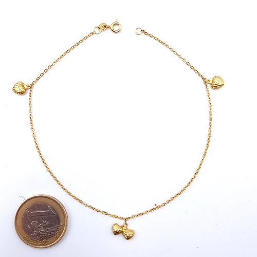 675 - A vintage 18 carat gold intricate bracelet, set with pretty love heart charms. 1.7G