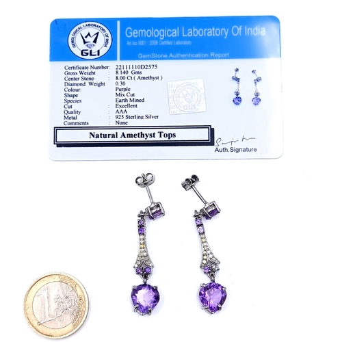 680 - Star lot : An elegant pair of amethyst  three carat heart shaped gemstone drop earrings, set with .3... 