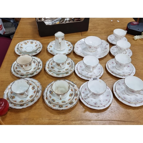 691 - A selection of 34 pieces of vintage China, including 16 pieces of Troy patterned tableware with a bl... 