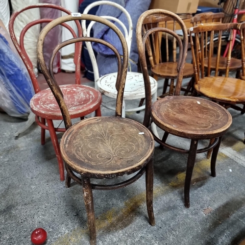 697 - Four charming bentwood chairs with lovely carved floral designs to seats, inc 2 painted examples.