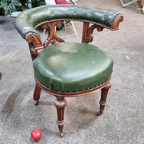 716 - Star lot : A fantastic example of a Victorian captain's open-arm club chair. Beautifully carved on a... 