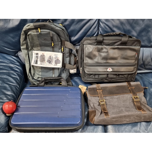 721 - Four bags including a Solo New York hybrid backpack, a Kattee messanger bag, a Paul and Shark hardca... 