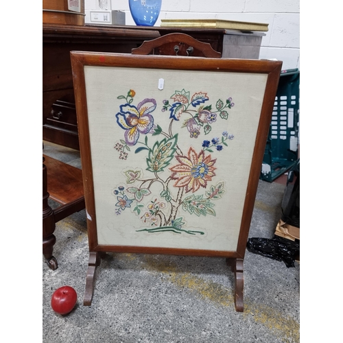 742 - A charming vintage fire screen with embroidered silk panel to center featuring foliate motifs.