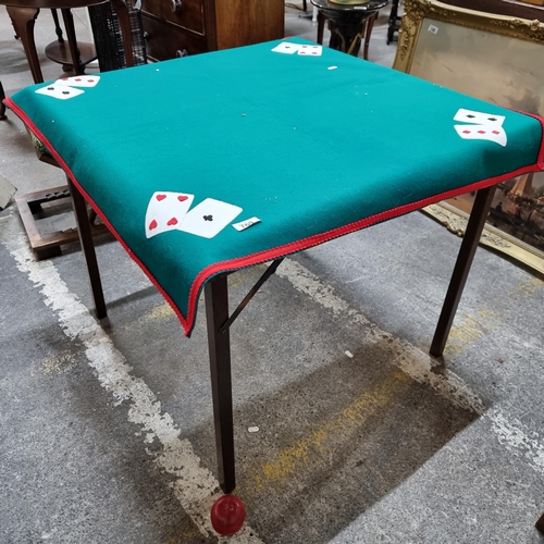 769 - A green felt games cloth, with foldaway games table. With folding games table included.