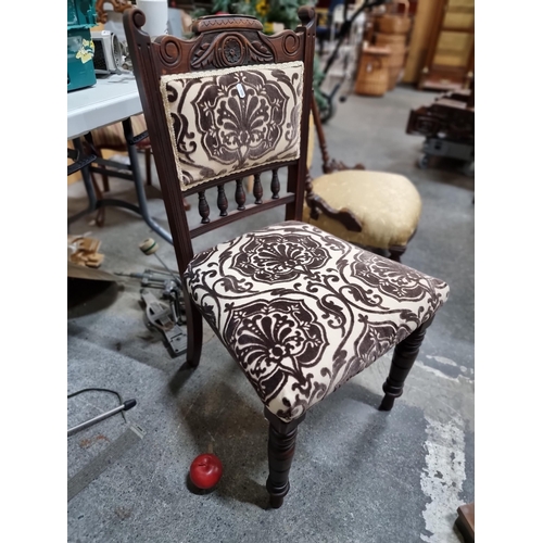 782 - A nice wooden chair with carved ornament, turned wood bobbins and upholstered in a thick brocade fab... 