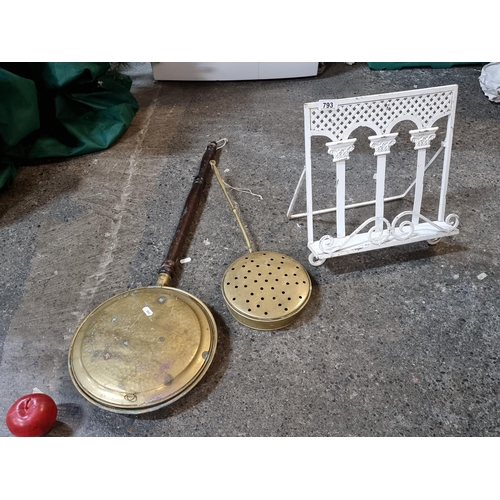 793 - A heavy cast metal book holder with neoclassical columnar ornament in a white finish a brass bed war... 