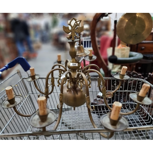 794 - A fabulous vintage large brass chandelier with 8 branches with curvilinear ornament.