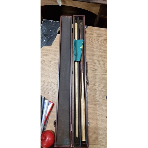 819 - A Lifestyle Sports Master snooker cue in original, brown leather, hard carry case. In excellent cond... 