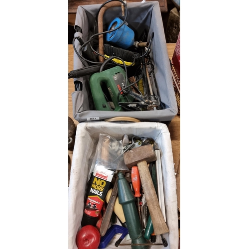 821 - Two baskets filled with various tools, such as a Bosch PST 54 jigsaw, a Black & Decker drill, handsa... 