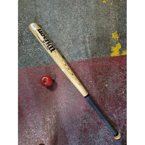 824 - A vintage Wilson wooden baseball bat, model no: 8500SB