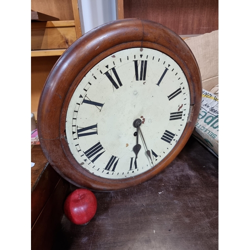 889 - A large antique one day wall clock with roman numeral face.