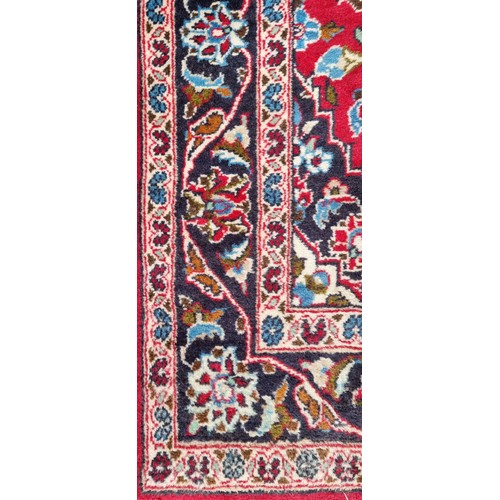 702 - Star lot : A fabulous hand knotted, hand made wool hall runner rug in jewel tones of red, green and ... 