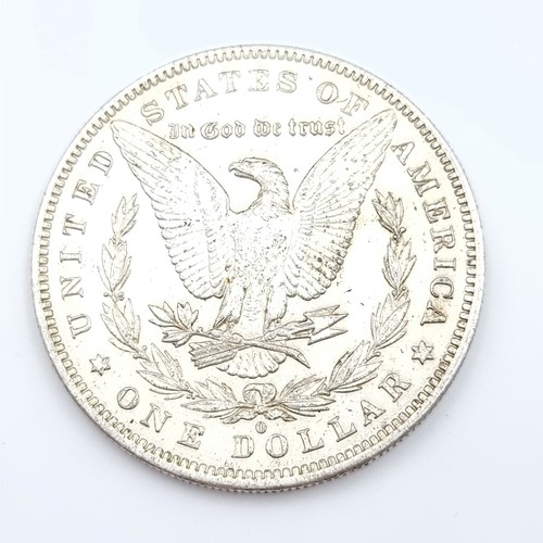 295 - A 1884 Morgan sterling silver U.S. Dollar coin with Lady Liberty and American Eagle. 26.78 grams.