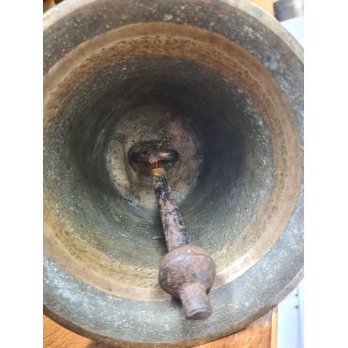 123 - A wonderful heavy, antique train station masters bell  bell. With a turned wooden handle, copper col... 