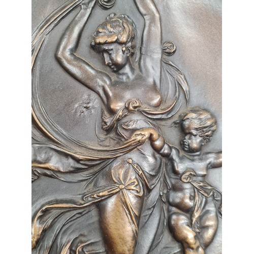 165 - Star lot : An elegant wall plaque with bronze relief figures of a mother and child signed 