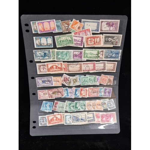 406 - A large collection of stamps, which includes Moroccan and continental examples. Together with an ass... 