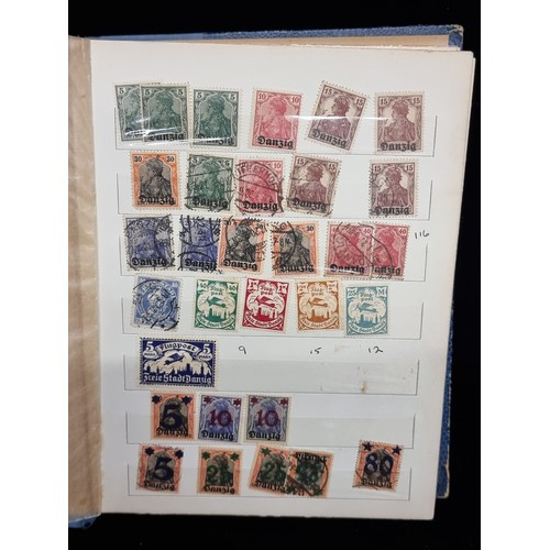 683 - An album of mint and cancelled older German Stamps pre WW2. Including over prints and Mint sets.