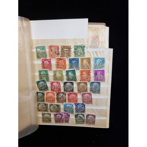 684 - A stamp album of 1930s-1960s German Stamps inc Hitler Stamps and mint sets about half full.