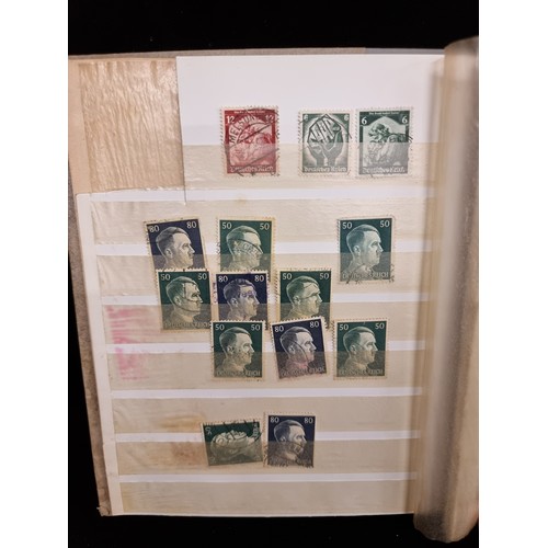 684 - A stamp album of 1930s-1960s German Stamps inc Hitler Stamps and mint sets about half full.