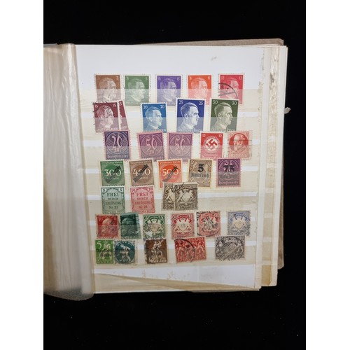 684 - A stamp album of 1930s-1960s German Stamps inc Hitler Stamps and mint sets about half full.