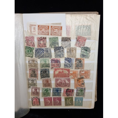 684 - A stamp album of 1930s-1960s German Stamps inc Hitler Stamps and mint sets about half full.