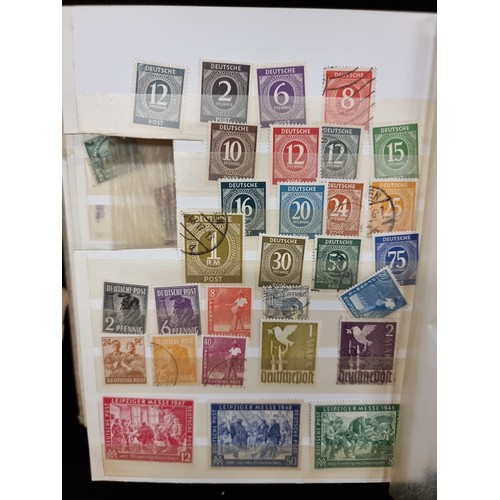 684 - A stamp album of 1930s-1960s German Stamps inc Hitler Stamps and mint sets about half full.