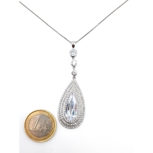 433 - A striking Sterling Silver crystal gemstone tear drop pendant necklace and chain. Length of chain: 4... 