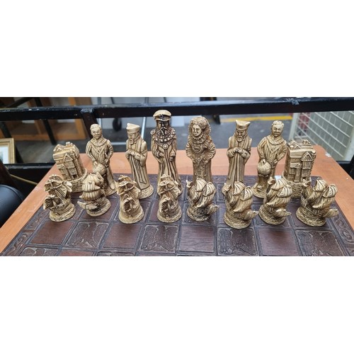 523 - Star lot : A fantastic figural chessboard with pieces inspired by Tudor England. Including a Queen E... 