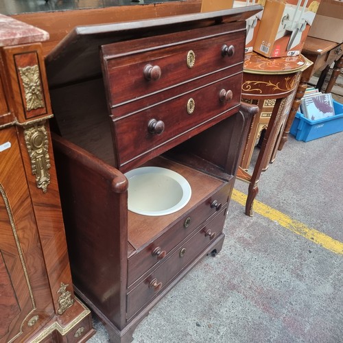 550 - An unusual commode  in the form of an antique chest with four drawers with a false facade. Complete ... 