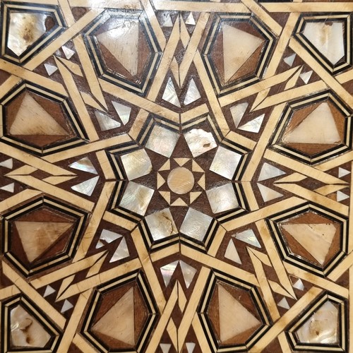 552 - Star lot : An octagonal side table, profusely inlaid with bone and mother of pearl in a geometric pa... 