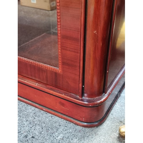 568 - Star lot : A stunning Italian sideboard with two glass fronted cupboards to side, two drawers below ... 