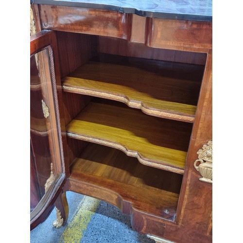 571 - Star Lot : A wonderfully grand credenza with two shelves inside, beautiful bow front glass doors and... 