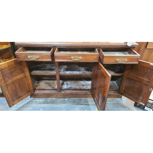 623 - Star lot : A stunning Victorian sideboard, with three doors and three drawers, beautiful brass drop ... 