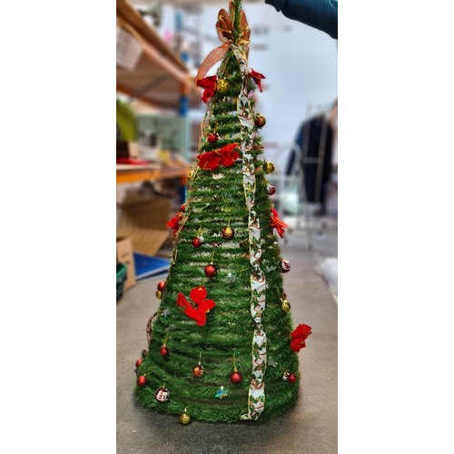 879 - Tall glittering gold and green tinsel spiral Christmas tree on a tripod base with matching gold and ... 