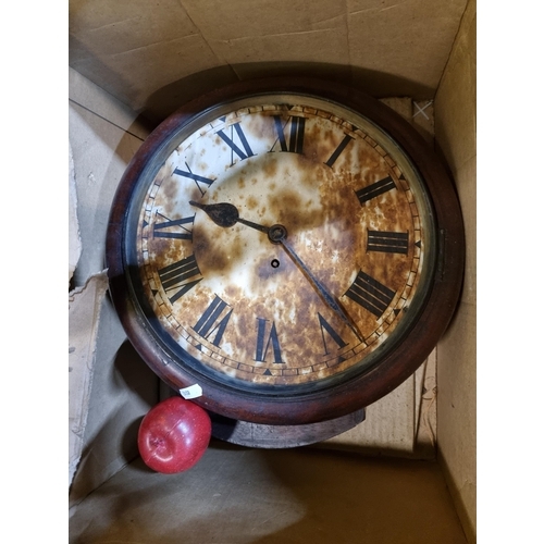 890 - A large antique one day wall clock with roman numerals and patina to face.