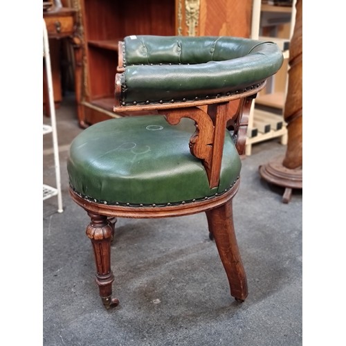 716 - Star lot : A fantastic example of a Victorian captain's open-arm club chair. Beautifully carved on a... 