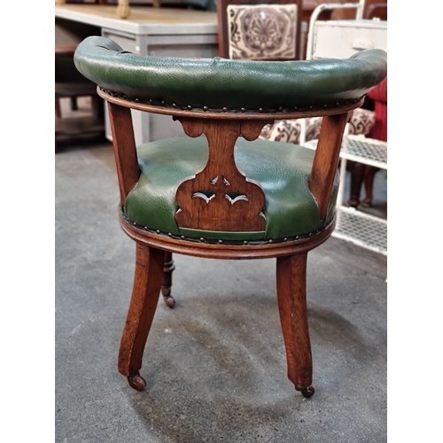 716 - Star lot : A fantastic example of a Victorian captain's open-arm club chair. Beautifully carved on a... 