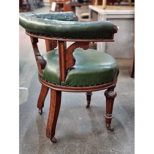 716 - Star lot : A fantastic example of a Victorian captain's open-arm club chair. Beautifully carved on a... 