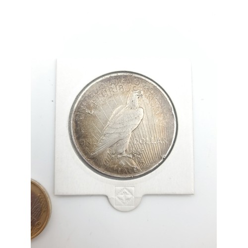 410 - A fine example of a 1922 United States silver Peace dollar, of 90% silver content. In excellent  con... 