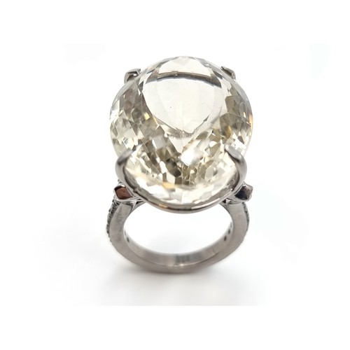 442 - A striking huge Lemon Quartz and Diamond sterling silver ring, with a truly huge centre stone of 48.... 