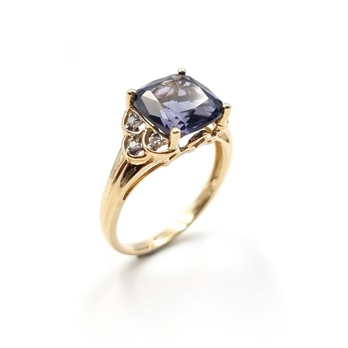 667 - Star lot : A beautiful 9 carat gold Amythyst and Diamond ring of a generous 5.9 carats and set with ... 