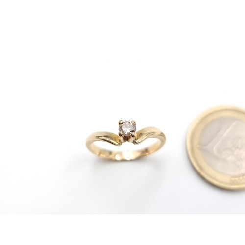 669 - Star lot : A striking 14 carat gold Diamond ring, which features an unusual crown setting and a broa... 