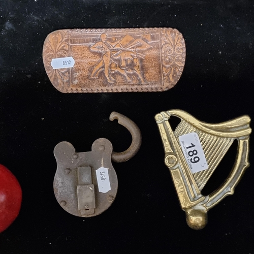 189 - Three interesting vintage items including a genuine leather glasses case, embossed with a matador mo... 