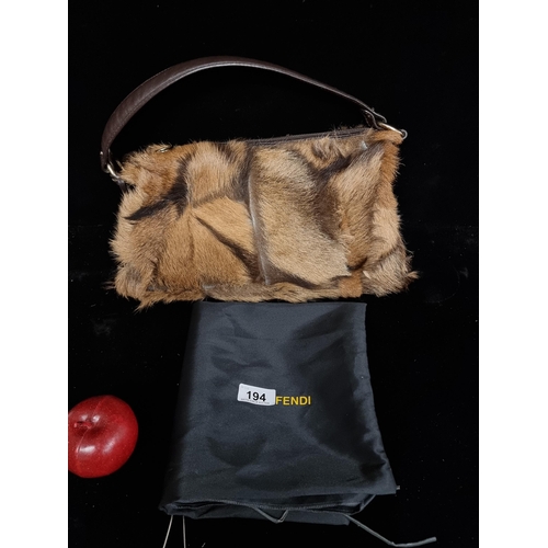 194 - Star Lot : A genuine fur nappa leather handbag by designer brand Fendi. Made in Italy with branded b... 