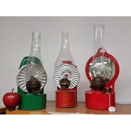 205 - A selection of three fabulous vintage wall oil lamps. Complete with three graduated glass shades. In... 